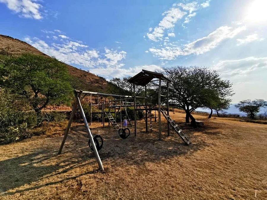 Play area with swings